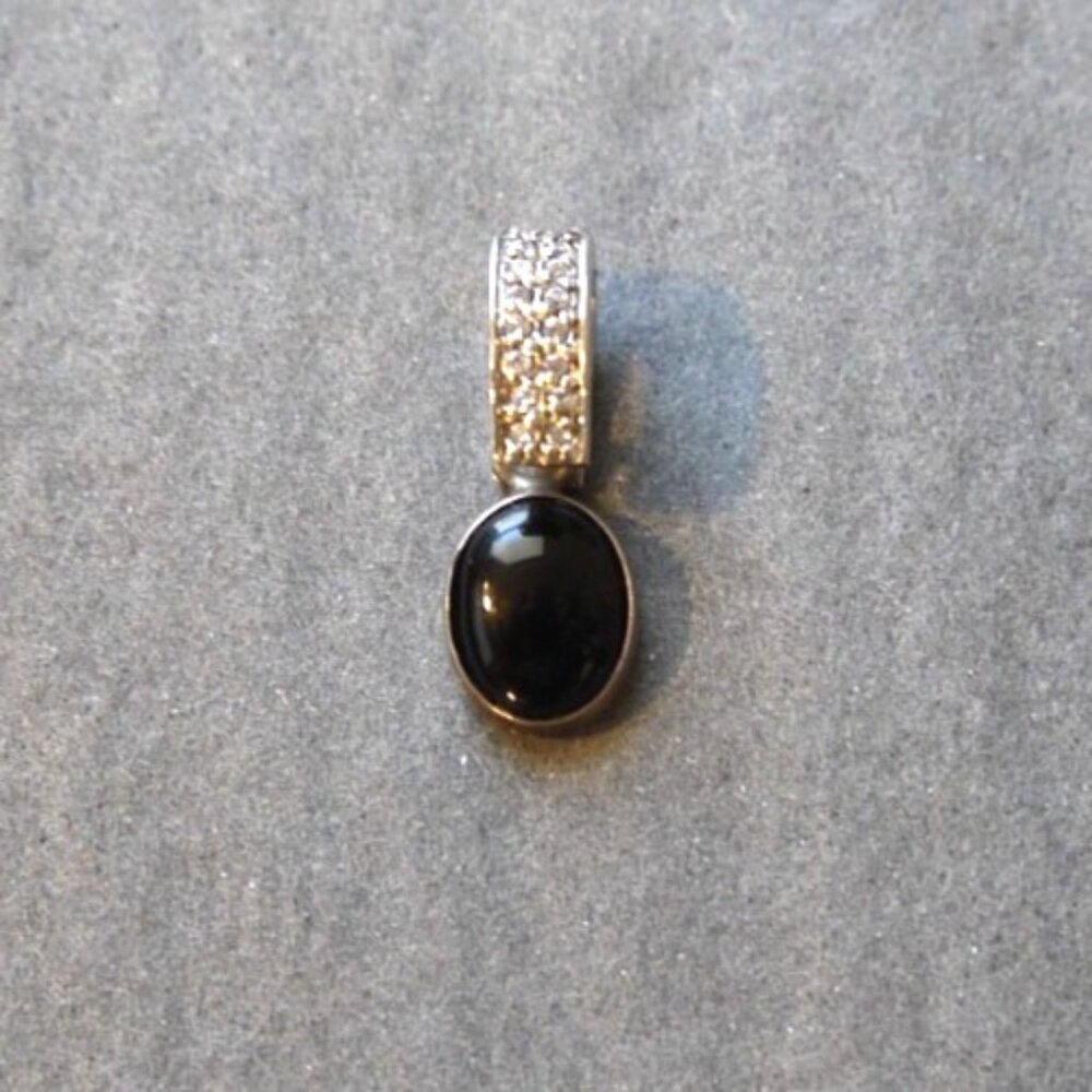 Vintage 925 Silver tiny pendant with unknown black stone and tiny clear chips